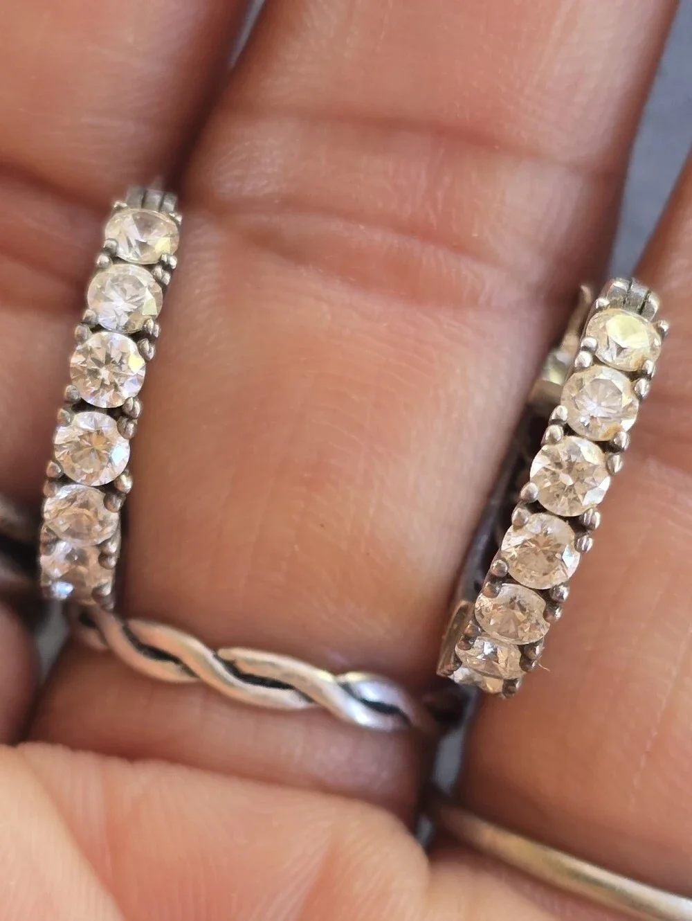 Elegant channel set sparkling CZ diamonds half filigree hoop earrings